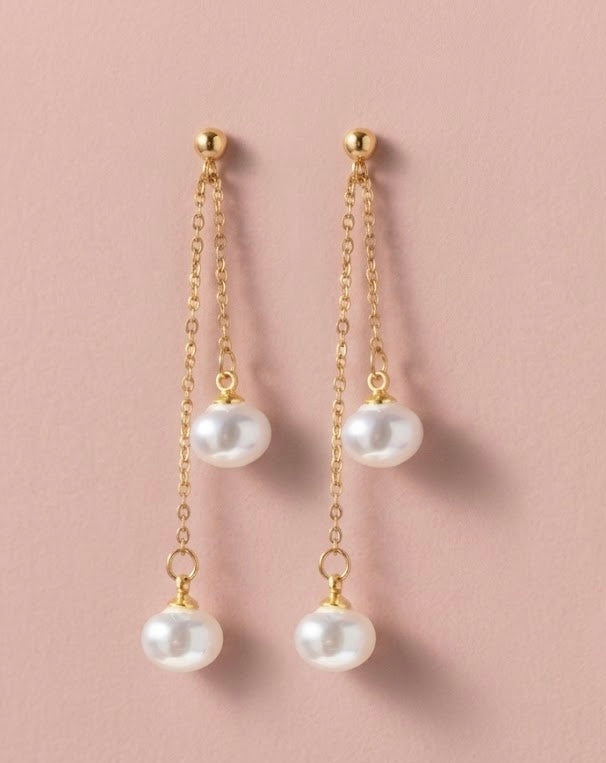 Boucles d’oreilles perles blanches